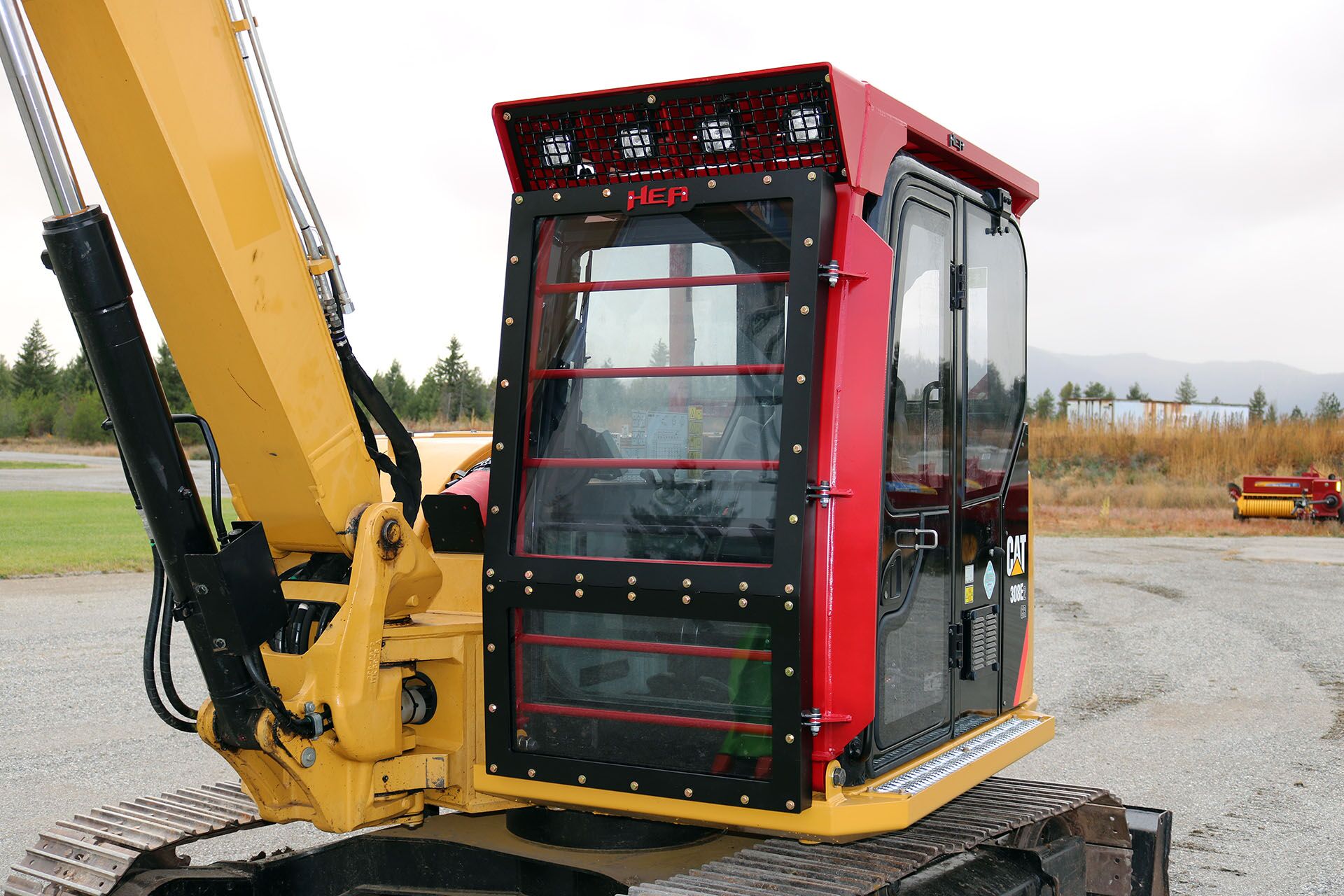 Caterpillar 308E2 Ballistic Logger Style Window and Top Cab Guard